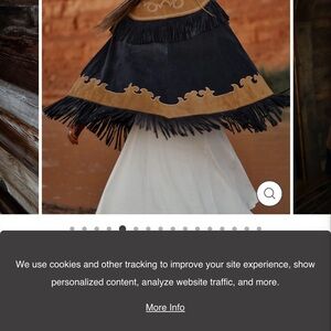 Elegant Black and Tan Cape with Fringe